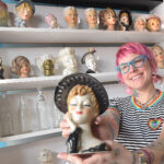 Jillian Kelly holds a head vase